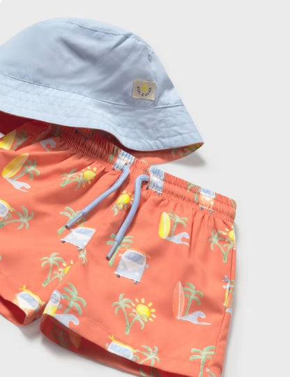 Conjunto bañador y gorro reversible protección solar bebé niño