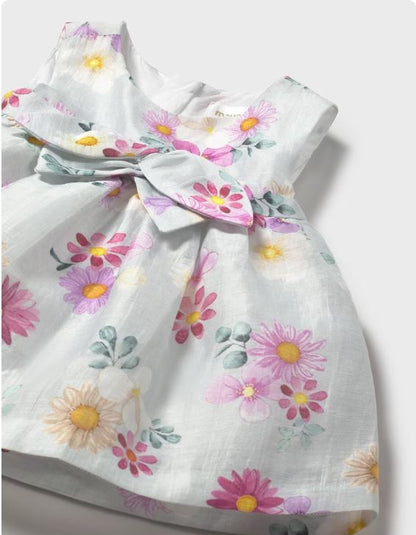 Vestido ceremonia flores recién nacida