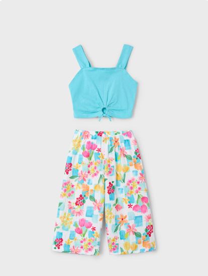 Conjunto pantalón largo estampado y top niña